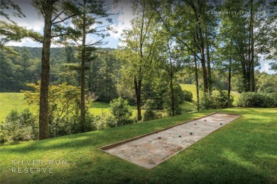 Nestled between soaring ridges in the southern corridor of on Headwaters Golf Club in North Carolina - for sale on GolfHomes.com, golf home, golf lot