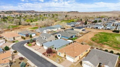 Experience golf course views in this updated three-bedroom on Quail Wood Greens Golf Course in Arizona - for sale on GolfHomes.com, golf home, golf lot