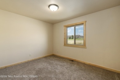 Experience maintenance-free living in this beautifully remodeled on Antelope Hills Golf Course in Wyoming - for sale on GolfHomes.com, golf home, golf lot