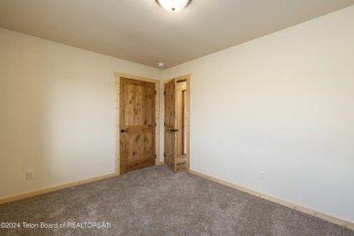 Experience maintenance-free living in this beautifully remodeled on Antelope Hills Golf Course in Wyoming - for sale on GolfHomes.com, golf home, golf lot