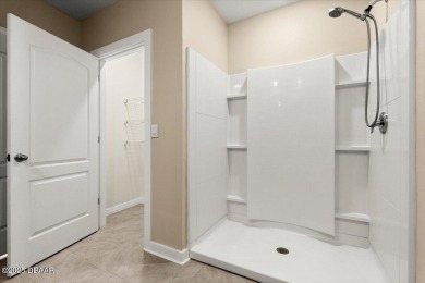 LAKEFRONT 5-bedroom, 3-bathroom, 2-car garage, concrete block on Venetian Bay Golf Course in Florida - for sale on GolfHomes.com, golf home, golf lot