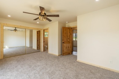 Experience maintenance-free living in this beautifully remodeled on Antelope Hills Golf Course in Wyoming - for sale on GolfHomes.com, golf home, golf lot