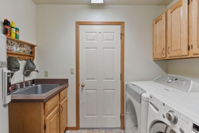 Enjoy privacy, charm, and location in this beautifully on Eagle Bend Golf Course in Montana - for sale on GolfHomes.com, golf home, golf lot