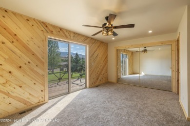 Experience maintenance-free living in this beautifully remodeled on Antelope Hills Golf Course in Wyoming - for sale on GolfHomes.com, golf home, golf lot