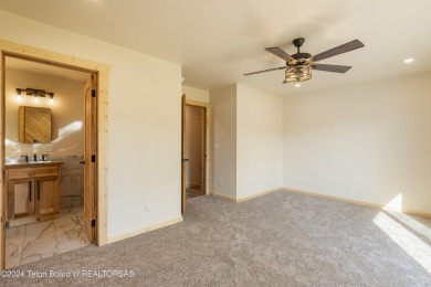 Experience maintenance-free living in this beautifully remodeled on Antelope Hills Golf Course in Wyoming - for sale on GolfHomes.com, golf home, golf lot