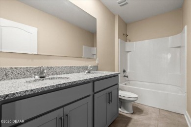 LAKEFRONT 5-bedroom, 3-bathroom, 2-car garage, concrete block on Venetian Bay Golf Course in Florida - for sale on GolfHomes.com, golf home, golf lot