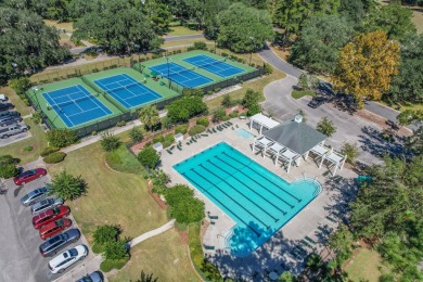 Discover the perfect blend of charm and modern comfort in this on Legend Oaks Plantation Golf Club in South Carolina - for sale on GolfHomes.com, golf home, golf lot