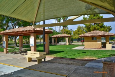 Location! Great corner unit on the greenspace! East facing patio on Sun Village Golf Course in Arizona - for sale on GolfHomes.com, golf home, golf lot