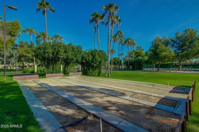 Location! Great corner unit on the greenspace! East facing patio on Sun Village Golf Course in Arizona - for sale on GolfHomes.com, golf home, golf lot