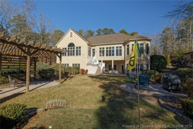 This elegant custom built home is an oasis! Nestled on the on Carolina Trace Country Club in North Carolina - for sale on GolfHomes.com, golf home, golf lot