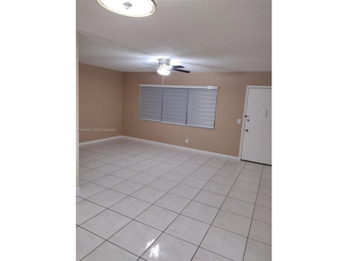 REMODELED, SPACIOUS, 1BR 1.5 BA, CONVENIENTLY LOCATED ON 1ST on Flamingo Lakes Country Club in Florida - for sale on GolfHomes.com, golf home, golf lot