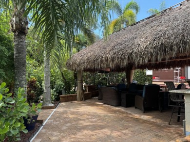 Beautiful landscaped . Large granite bar for wonderful outdoor on St. Lucie Trail Golf Club in Florida - for sale on GolfHomes.com, golf home, golf lot
