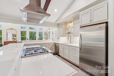 Hollywood glam meets the mountains at 193 Gateway Drive in on Rumbling Bald Resort on Lake Lure in North Carolina - for sale on GolfHomes.com, golf home, golf lot