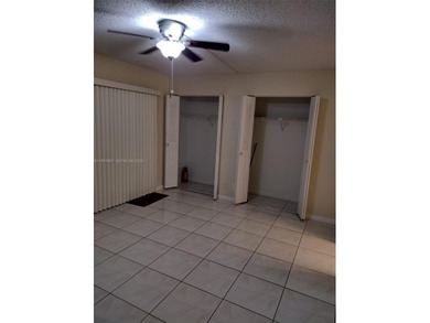 REMODELED, SPACIOUS, 1BR 1.5 BA, CONVENIENTLY LOCATED ON 1ST on Flamingo Lakes Country Club in Florida - for sale on GolfHomes.com, golf home, golf lot