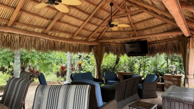 Beautiful landscaped . Large granite bar for wonderful outdoor on St. Lucie Trail Golf Club in Florida - for sale on GolfHomes.com, golf home, golf lot