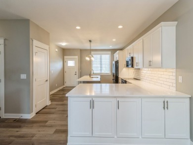 Enjoy panoramic views of Hole #10 at the Indianola Golf Club on Indianola Golf and Country Club in Iowa - for sale on GolfHomes.com, golf home, golf lot