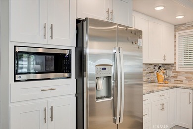 Beautifully remodeled ground level Casa Contenta with absolutely on Leisure Village Par 3 Golf Course in California - for sale on GolfHomes.com, golf home, golf lot