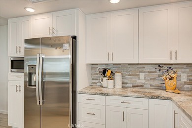 Beautifully remodeled ground level Casa Contenta with absolutely on Leisure Village Par 3 Golf Course in California - for sale on GolfHomes.com, golf home, golf lot