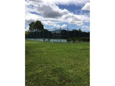 REMODELED, SPACIOUS, 1BR 1.5 BA, CONVENIENTLY LOCATED ON 1ST on Flamingo Lakes Country Club in Florida - for sale on GolfHomes.com, golf home, golf lot