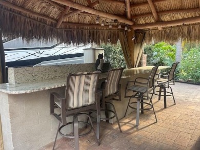 Beautiful landscaped . Large granite bar for wonderful outdoor on St. Lucie Trail Golf Club in Florida - for sale on GolfHomes.com, golf home, golf lot