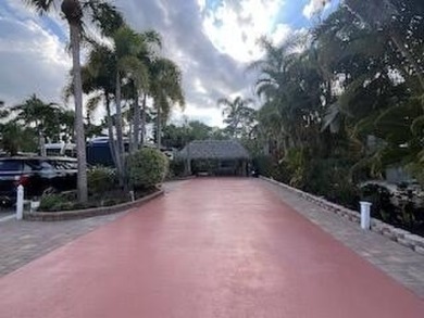 Beautiful landscaped . Large granite bar for wonderful outdoor on St. Lucie Trail Golf Club in Florida - for sale on GolfHomes.com, golf home, golf lot