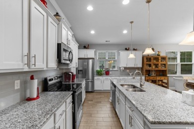 Welcome to 1003 Oak Marsh Lane! This is a pristine home nestled on Tidewater Golf Club and Plantation in South Carolina - for sale on GolfHomes.com, golf home, golf lot
