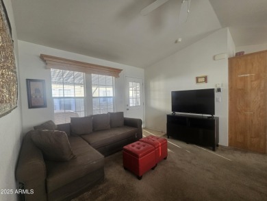 This 2-bedroom, 2-bathroom home features a large storage shed on Viewpoint Golf Resort in Arizona - for sale on GolfHomes.com, golf home, golf lot