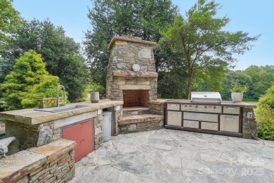 Hollywood glam meets the mountains at 193 Gateway Drive in on Rumbling Bald Resort on Lake Lure in North Carolina - for sale on GolfHomes.com, golf home, golf lot