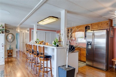 Welcome to this beautifully maintained manufactured home located on Bonita Fairways in Florida - for sale on GolfHomes.com, golf home, golf lot