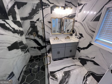 Welcome to this stunning contemporary home in sought-after East on East Lake Golf Club in Georgia - for sale on GolfHomes.com, golf home, golf lot