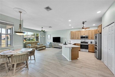 Nestled in the prestigious gated Herons Glen Golf & Country Club on Herons Glen Golf and Country Club in Florida - for sale on GolfHomes.com, golf home, golf lot