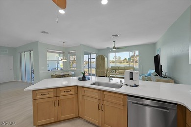 Nestled in the prestigious gated Herons Glen Golf & Country Club on Herons Glen Golf and Country Club in Florida - for sale on GolfHomes.com, golf home, golf lot