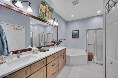 Nestled in the prestigious gated Herons Glen Golf & Country Club on Herons Glen Golf and Country Club in Florida - for sale on GolfHomes.com, golf home, golf lot