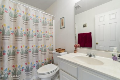 Welcome to this charming and well-appointed single-story home on Crow Creek Golf Club in North Carolina - for sale on GolfHomes.com, golf home, golf lot