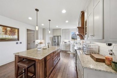 Hurry to see this stunning home with a finished walkout lower on Lakeside Hills Golf Course in Kansas - for sale on GolfHomes.com, golf home, golf lot