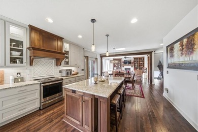 Hurry to see this stunning home with a finished walkout lower on Lakeside Hills Golf Course in Kansas - for sale on GolfHomes.com, golf home, golf lot