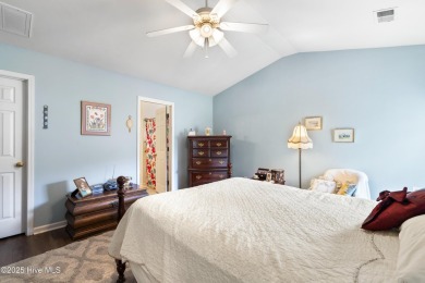 Welcome to this charming and well-appointed single-story home on Crow Creek Golf Club in North Carolina - for sale on GolfHomes.com, golf home, golf lot
