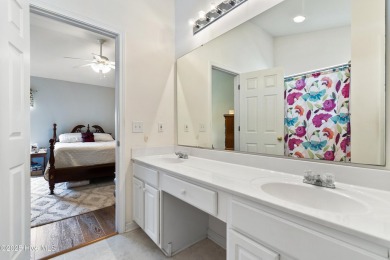 Welcome to this charming and well-appointed single-story home on Crow Creek Golf Club in North Carolina - for sale on GolfHomes.com, golf home, golf lot