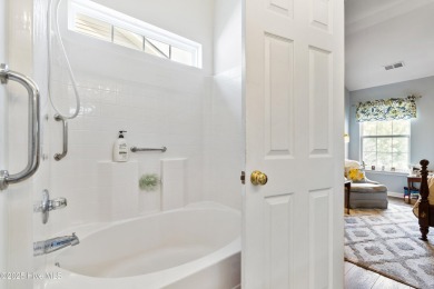 Welcome to this charming and well-appointed single-story home on Crow Creek Golf Club in North Carolina - for sale on GolfHomes.com, golf home, golf lot