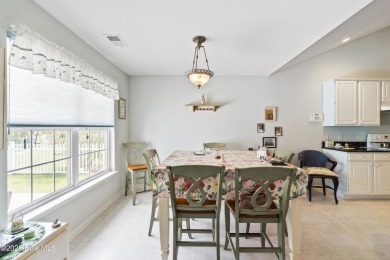 Welcome to this charming and well-appointed single-story home on Crow Creek Golf Club in North Carolina - for sale on GolfHomes.com, golf home, golf lot