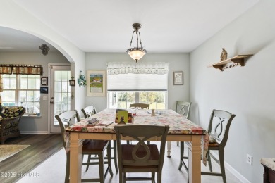 Welcome to this charming and well-appointed single-story home on Crow Creek Golf Club in North Carolina - for sale on GolfHomes.com, golf home, golf lot