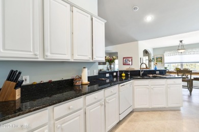 Welcome to this charming and well-appointed single-story home on Crow Creek Golf Club in North Carolina - for sale on GolfHomes.com, golf home, golf lot