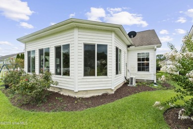 Welcome to this charming and well-appointed single-story home on Crow Creek Golf Club in North Carolina - for sale on GolfHomes.com, golf home, golf lot