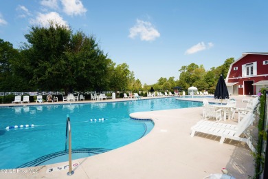 Welcome to this charming and well-appointed single-story home on Crow Creek Golf Club in North Carolina - for sale on GolfHomes.com, golf home, golf lot