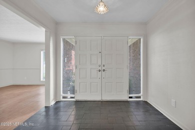 Check out this delightful home with super curb appeal in on Blue Cypress Golf Club in Florida - for sale on GolfHomes.com, golf home, golf lot