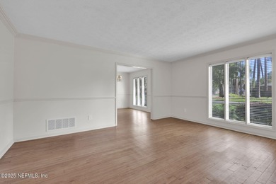 Check out this delightful home with super curb appeal in on Blue Cypress Golf Club in Florida - for sale on GolfHomes.com, golf home, golf lot