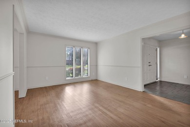 Check out this delightful home with super curb appeal in on Blue Cypress Golf Club in Florida - for sale on GolfHomes.com, golf home, golf lot