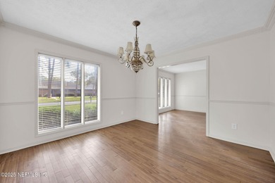 Check out this delightful home with super curb appeal in on Blue Cypress Golf Club in Florida - for sale on GolfHomes.com, golf home, golf lot