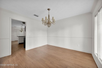 Check out this delightful home with super curb appeal in on Blue Cypress Golf Club in Florida - for sale on GolfHomes.com, golf home, golf lot