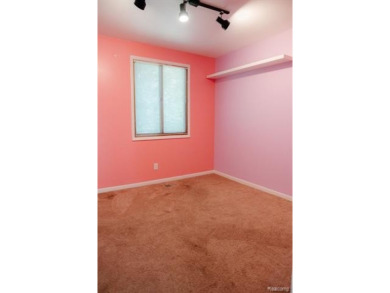 What an amazing opportunity to own an affordable home in on Edgewood Country Club in Michigan - for sale on GolfHomes.com, golf home, golf lot